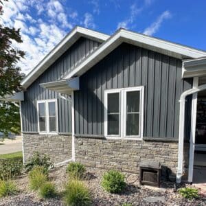 Texture, blue vertical siding and stone