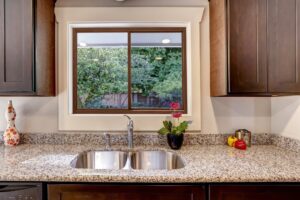 ProVia Aeris slider kitchen window with wood cladding