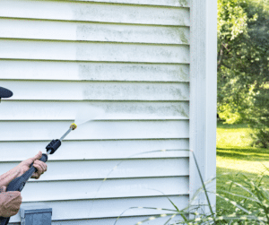  Dirty siding cleaned with a power washer 